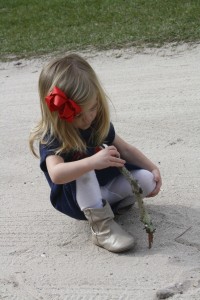 She had fun doodling in the sand